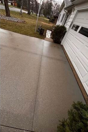 Affordable Concrete Driveway Pressure Cleaning Kalamazoo MI after cleaning by Swift Power & Soft Washing