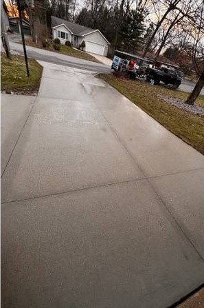 Affordable Concrete Driveway Pressure Cleaning Portage MI after cleaning by Swift Power & Soft Washing