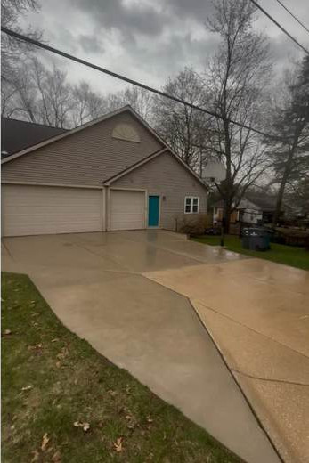 Affordable Concrete Driveway Pressure Cleaning Vicksburg MI after cleaning by Swift Power & Soft Washing