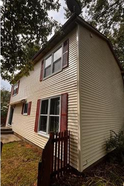 Affordable Painted Siding House Soft Washing Services Portage MI after cleaning by Swift Power & Soft Washing