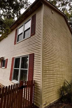 Affordable Painted Siding House Soft Washing Services Portage MI before cleaning