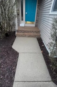 Front walkway pressure washing in Kalamazoo, MI, after cleaning
